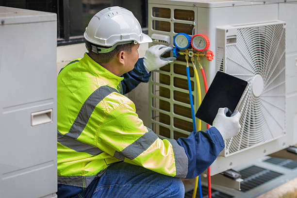 Professional Hvac technician working in Fitchburg, MA